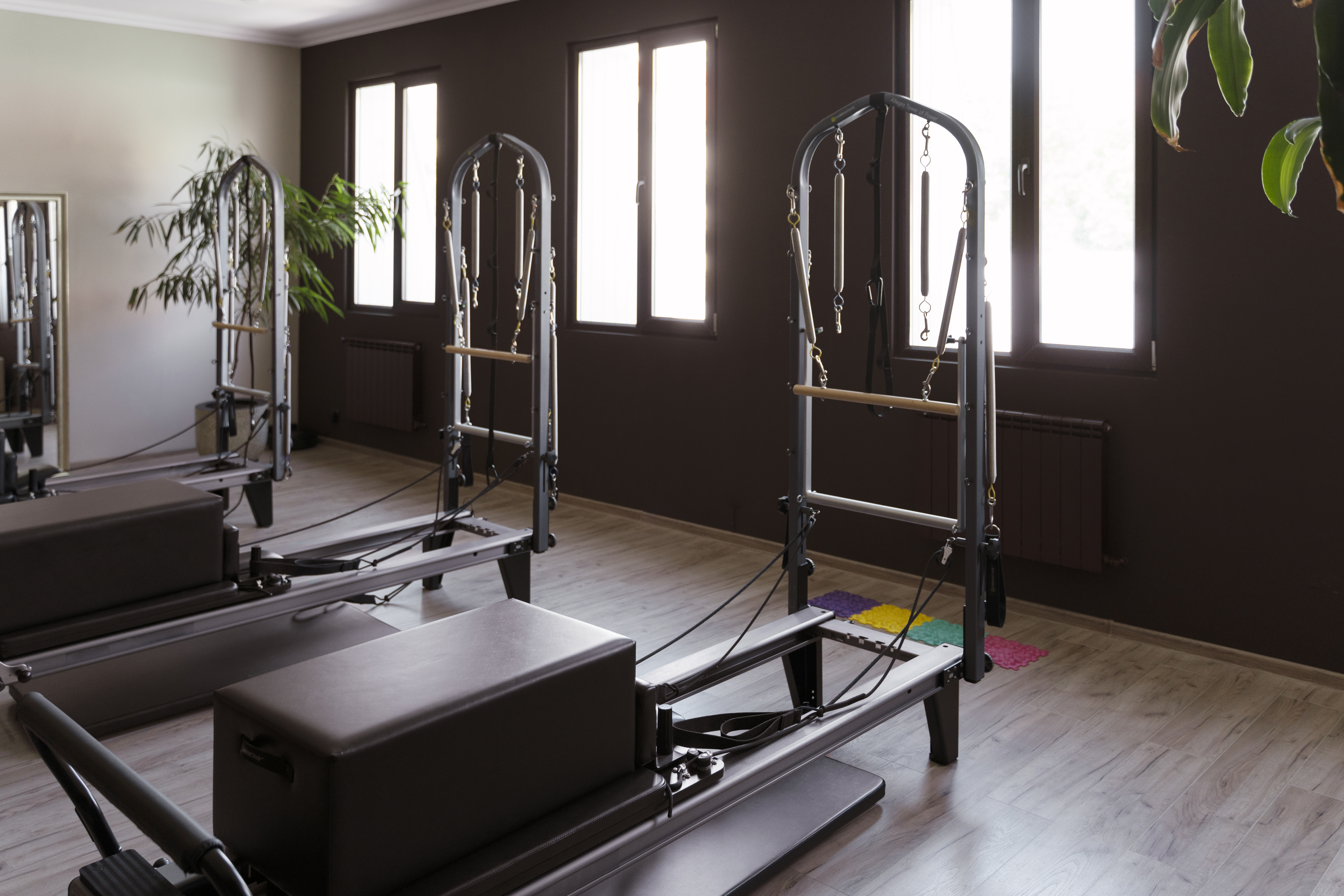 pilates reformer classroom with equipment